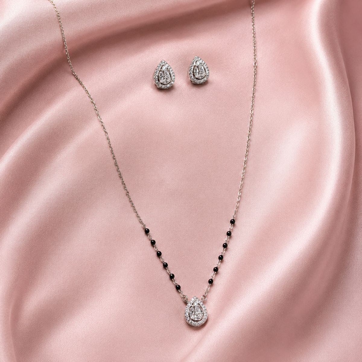 925 sterling silver mangalsutra set with black beads and matching earrings