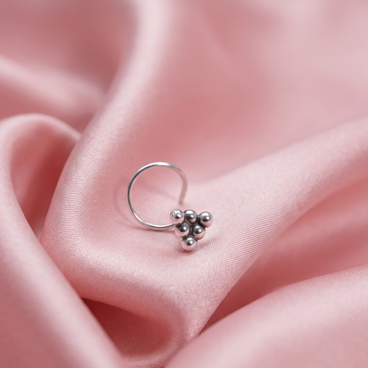 925 sterling silver nose pin with three tiny silver beads in a triangular pattern