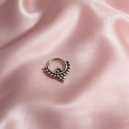 Oxidised 925 sterling silver beaded septum nose ring featuring a distinctive arrow-shaped centre detail.